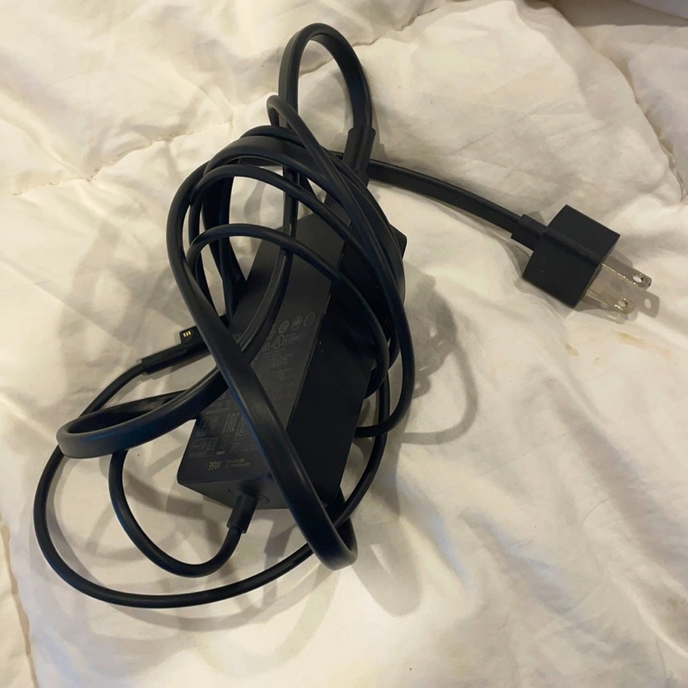 Microsoft Surface Pro 4 Charger/ older keyboard attachment.